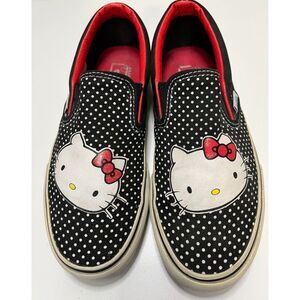 Vans black and white polka dot Hello Kitty classic slip-ons. Size 5.5(M); 7(W).